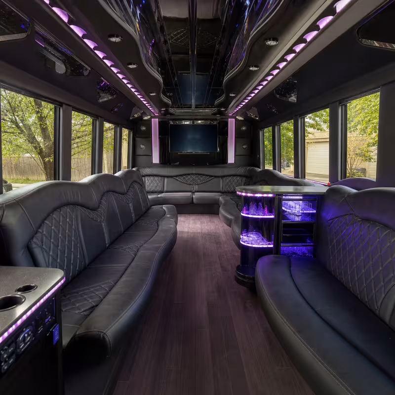 Friends laughing during a Bellevue party bus celebration