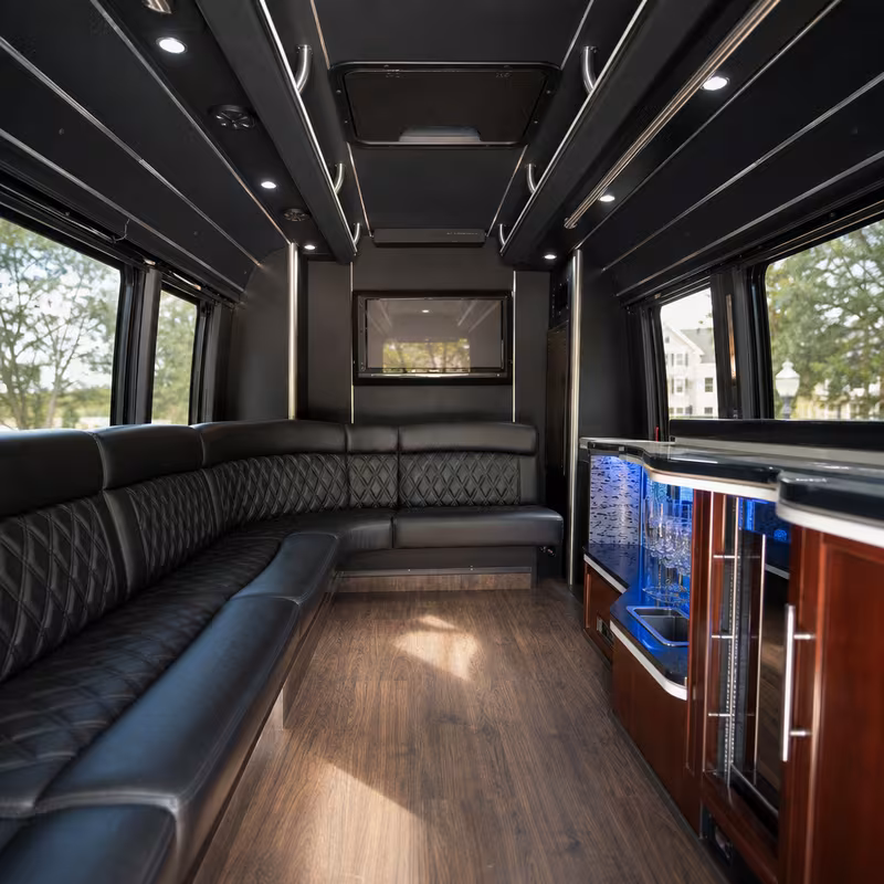 Passenger watching the Bellevue scenery during a regional party bus road trip