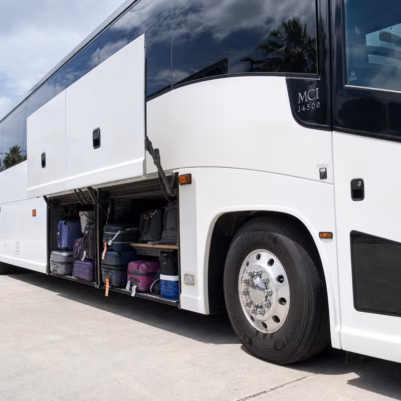 Party bus interior with wraparound leather seating and LED lighting in Bellevue