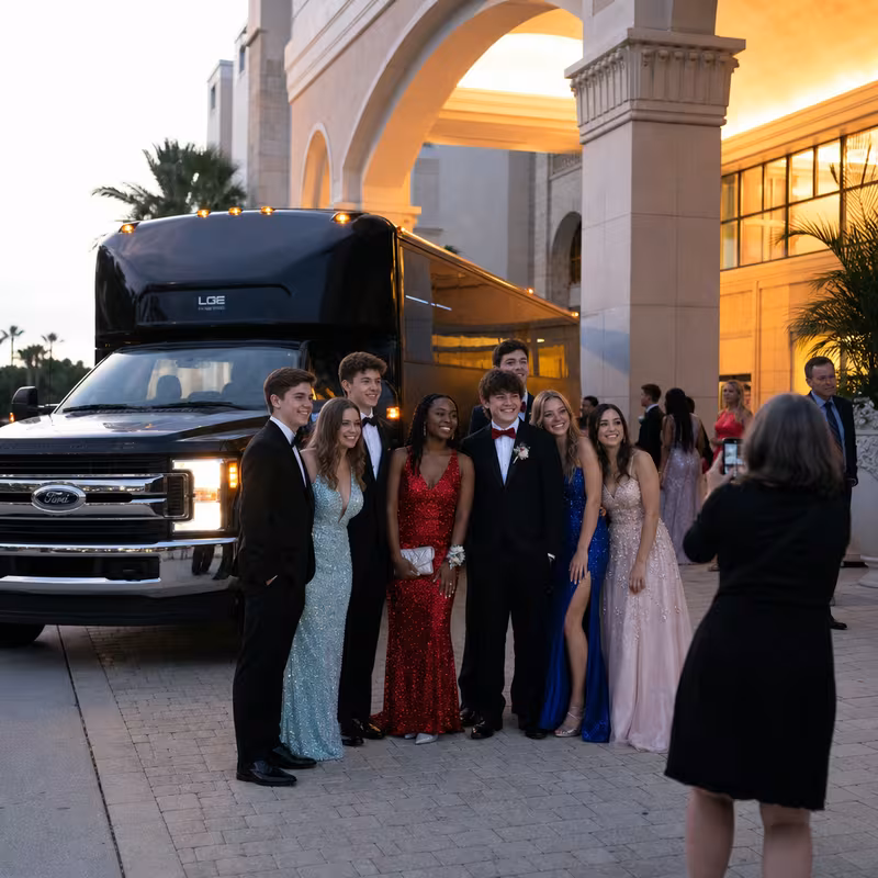 Party bus interior with wraparound leather seating and LED lighting in Bellevue