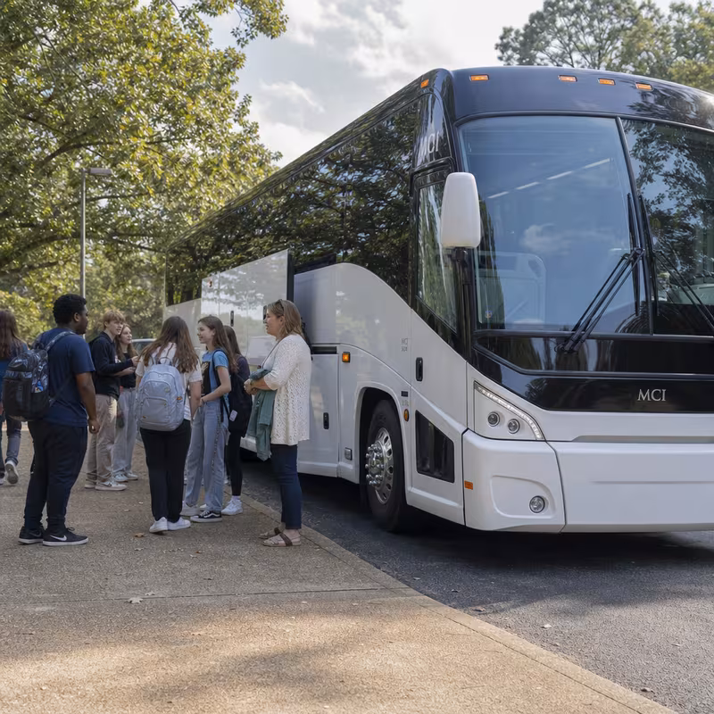 Black Mercedes Sprinter van staged for an Bellevue School Transportation group