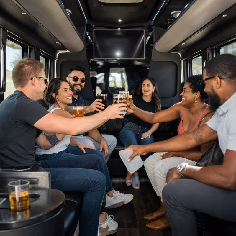 Black Mercedes Sprinter van staged for an Bellevue Winery & Brewery Tour Transportation group